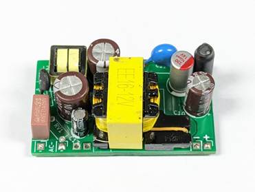 A green circuit board with many different components

AI-generated content may be incorrect.